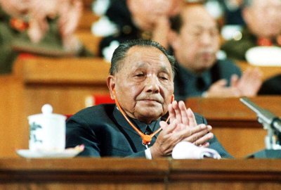Chinese Paramount Leader Deng Xiaoping Applauds