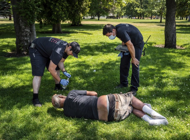 Firefighters Check on Man