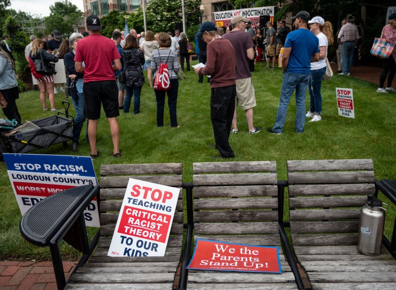 Signs are seen on a bench during 