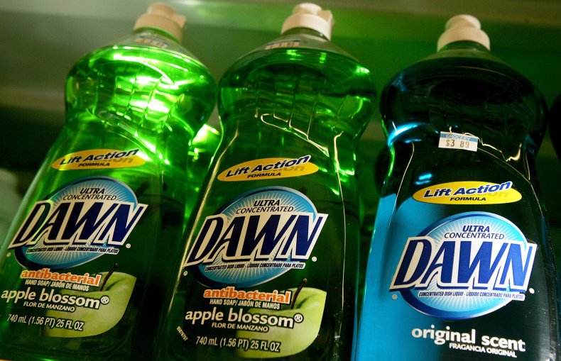 Bottles of Dawn dish soap on shelf.