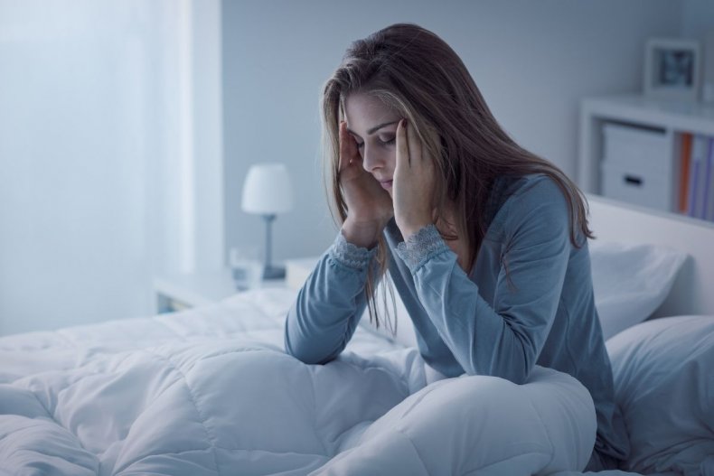 File photo of woman struggling to sleep
