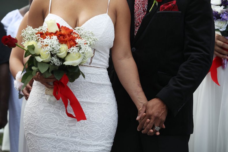 A Couple Participate in a Group Wedding