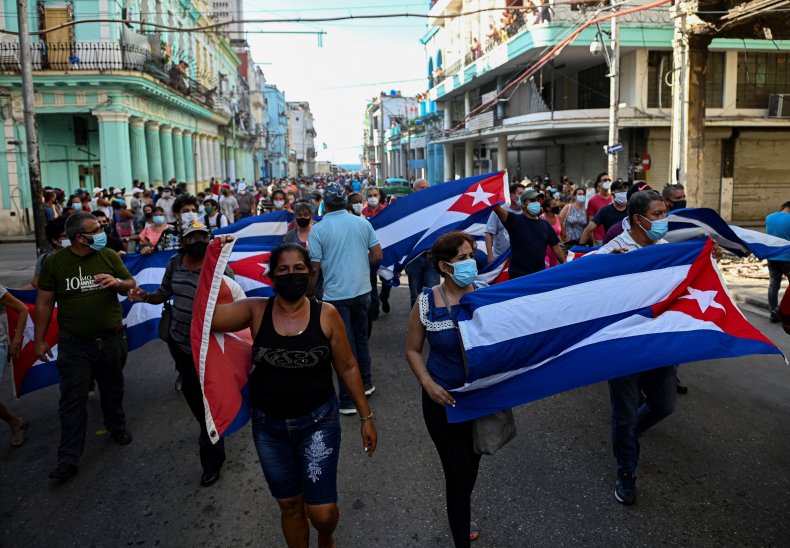 People take part in protests in Havana.