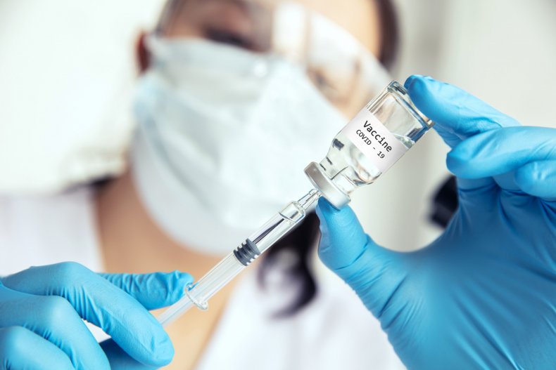 Health worker prepares a COVID-19 vaccine