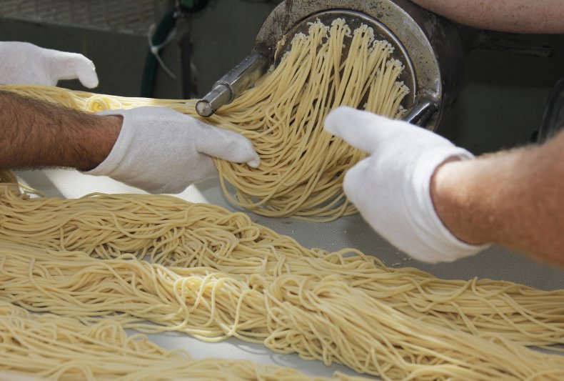 Spaghetti being prepared
