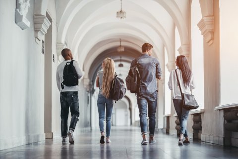 PLUS: College students walking down hall