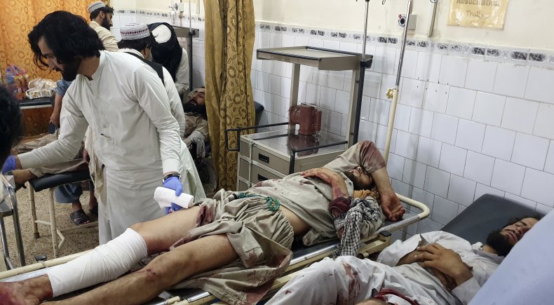 Reuters Photographer, Afghan Officer Killed in Crossfire