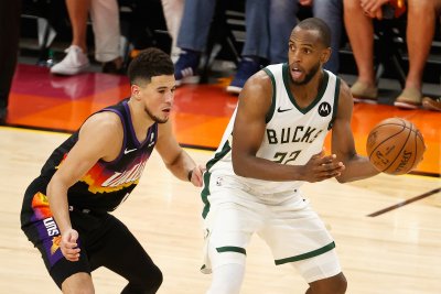Devin Booker and Khris Middleton Devin Booker and Khris Middleton