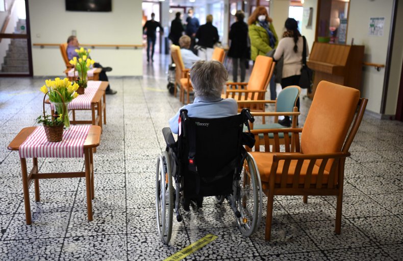 A nursing home resident awaits COVID-19 vaccination.