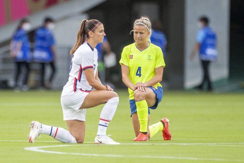 Tokyo 2020 soccer players take the knee