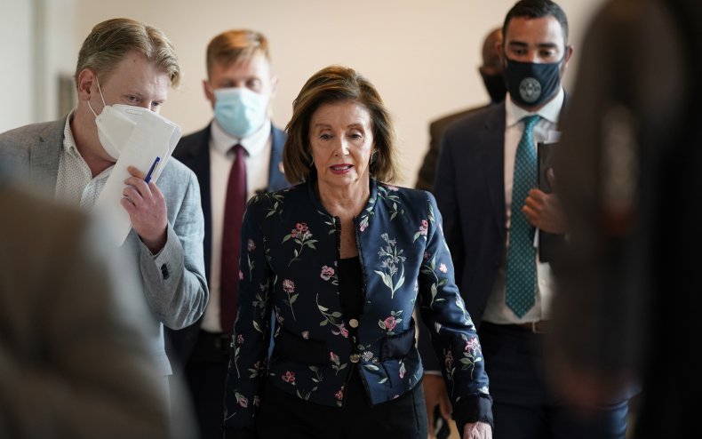 Nancy Pelosi speaks with reporters