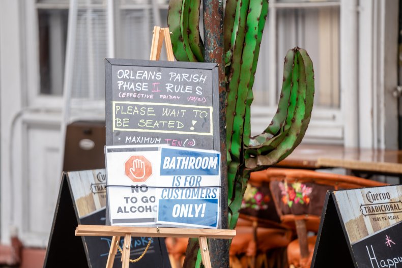 COVID signage in New Orleans Mardi Gras