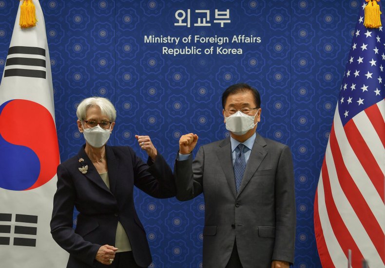 Wendy Sherman Bumps Elbows with Chung Eui-yong