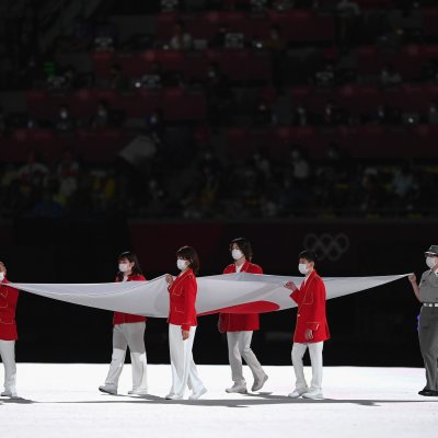 Japanese flag carried during Olympics opening ceremony Japanese flag carried during Olympics opening ceremony