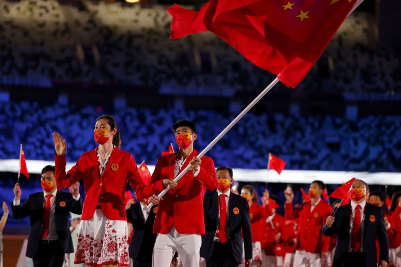 China's Flag Bearers Parade at the Olympics
