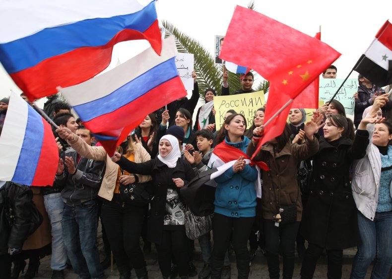 Government, rally, Russia, China, Syria, flags