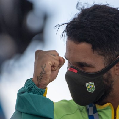 Brazilian surfer Italo Ferreira celebrates gold medal