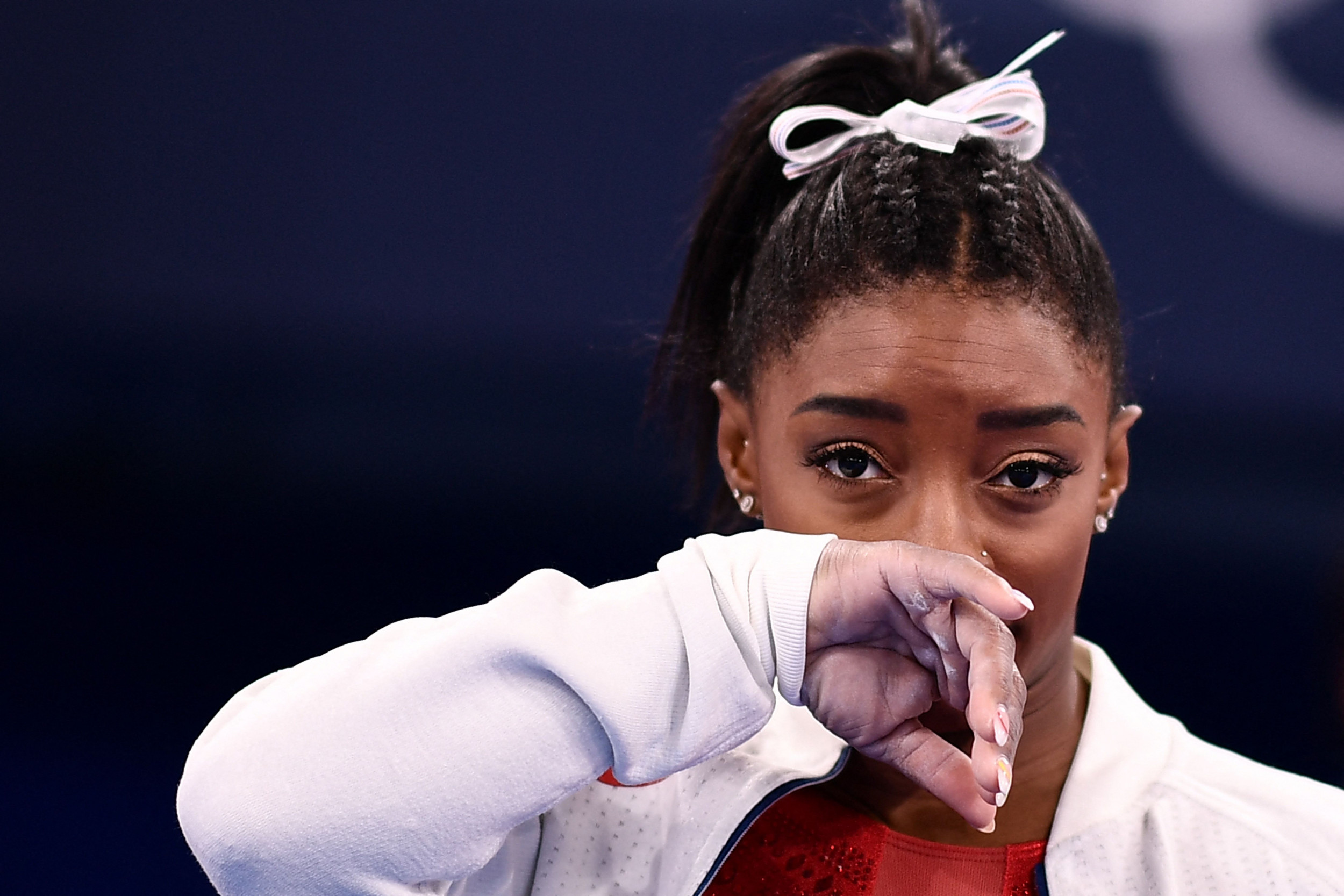 why is simone out of the olympics , why is my finger twitching