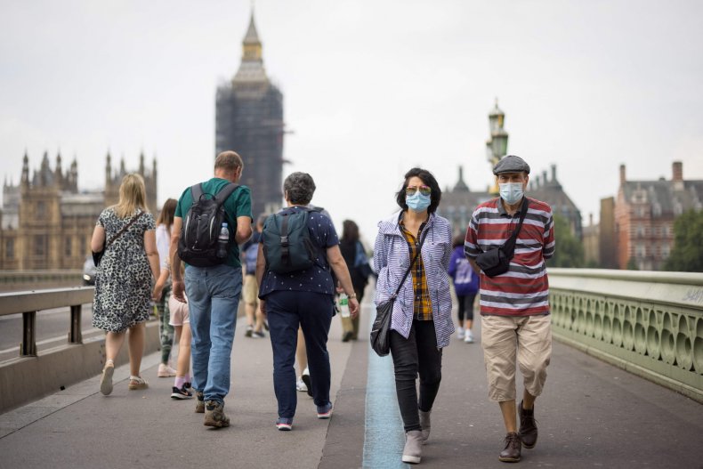 Pedestrians cross Westminster Bridge