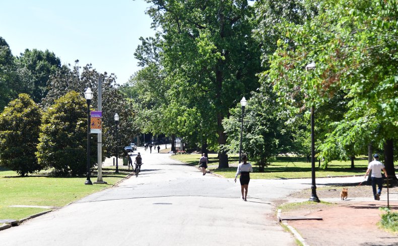People walk through Piedmont Park