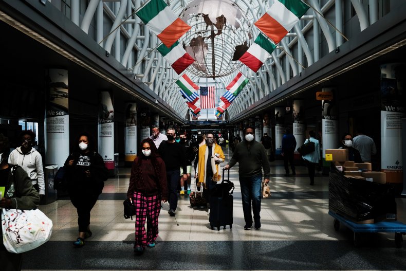 People walking through Chicago's O’Hare airport.