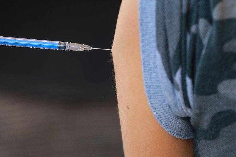 A person is vaccinated against COVID-19.