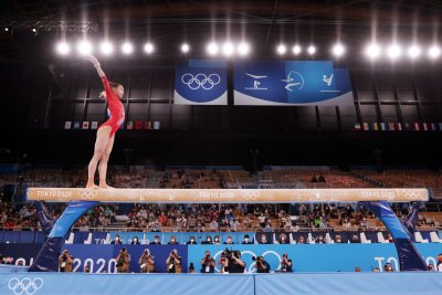 China Gymnasts Clinch Gold, Silver With Biles China Gymnasts Clinch Gold, Silver With Biles