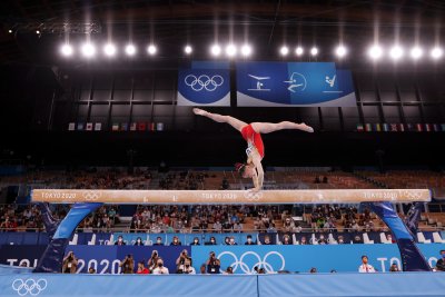 China Gymnasts Clinch Gold, Silver With Biles China Gymnasts Clinch Gold, Silver With Biles
