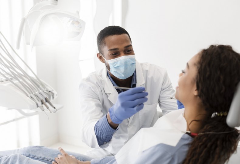 Dentist performing treatment