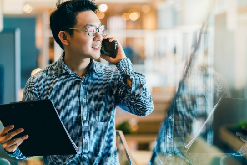 Man working in an office background