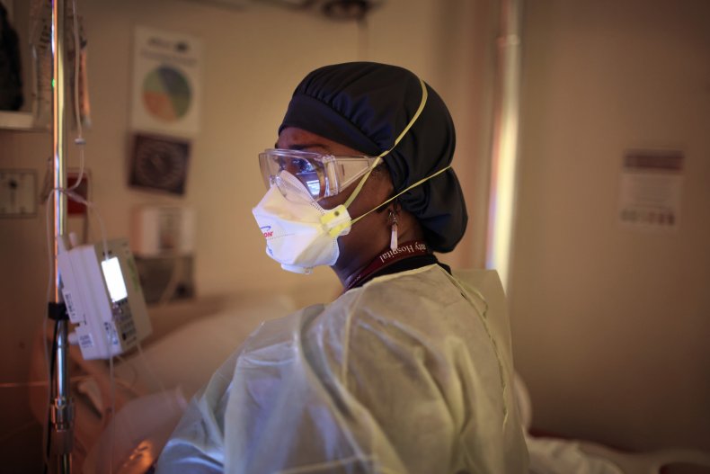 A woman performs an echocardiogram