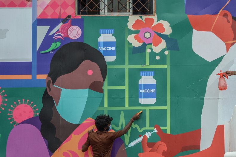 A COVID vaccination mural in India.
