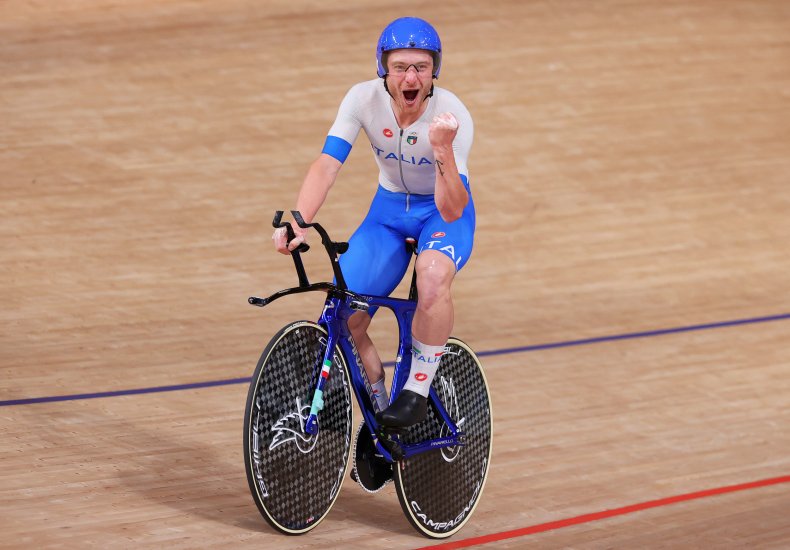 Team Italy cyclist celebrates win at Tokyo