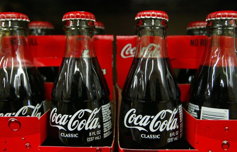 Glass bottles of Coca Cola in store