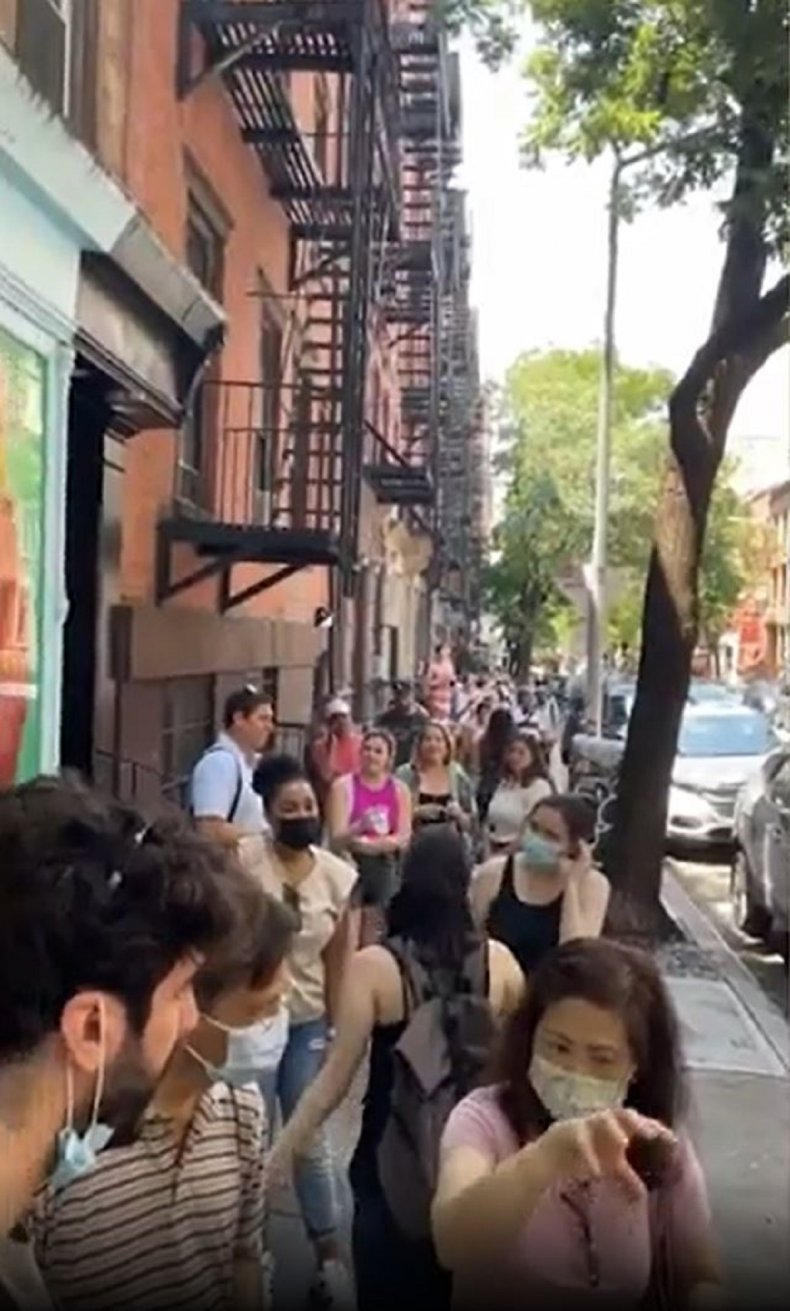 Photo of queue to view NYC apartment.
