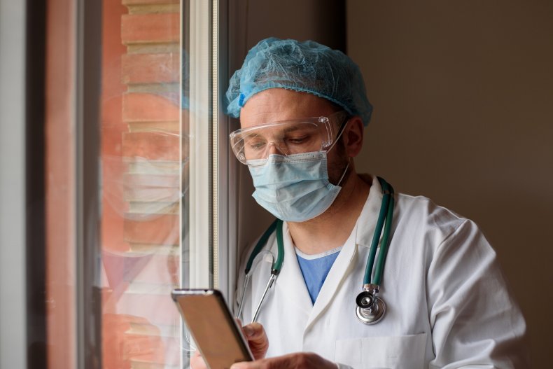 A doctor on his phone.