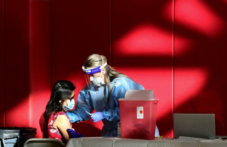 Woman receives Covid vaccine
