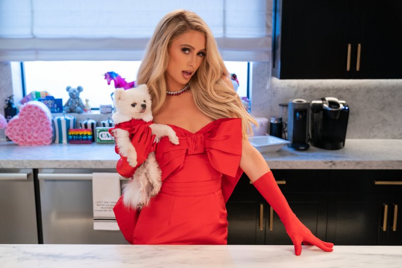 Paris Hilton poses with her dog 