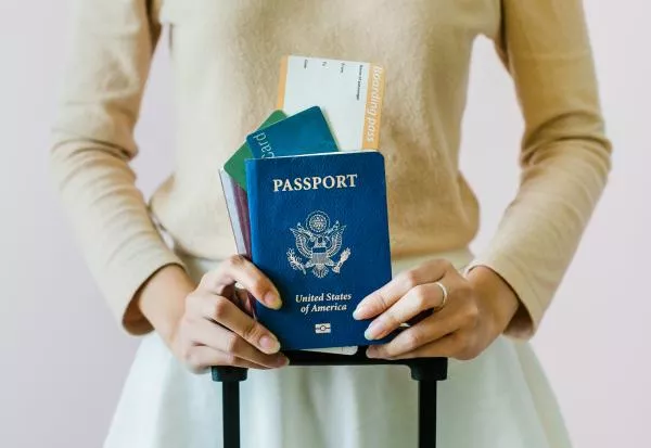 Woman holding American passport