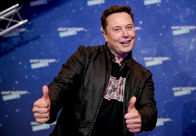 Elon Musk giving thumbs up 