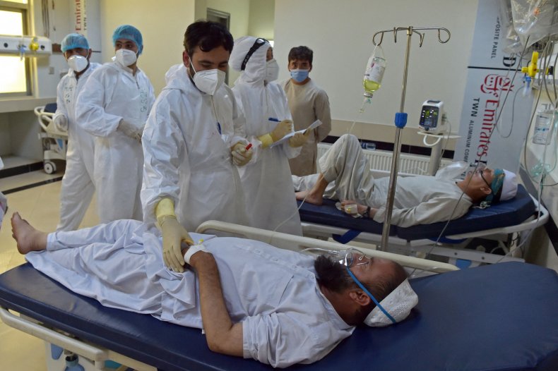 Medical staff treat COVID patients in Afghanistan