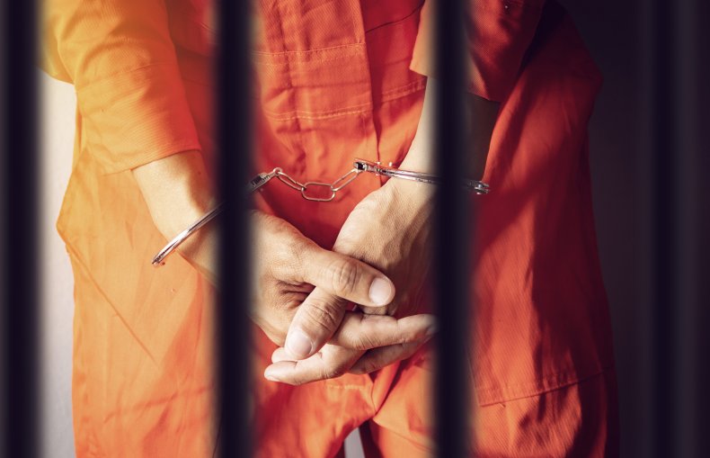Man arrested in orange jumpsuit