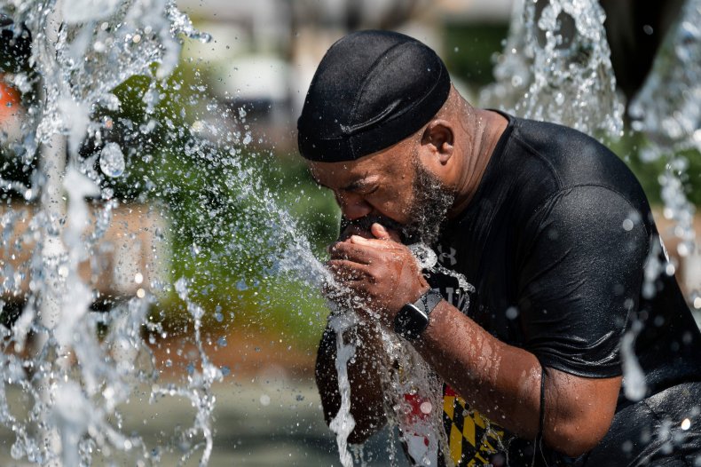 A man cooling off in Baltimore.