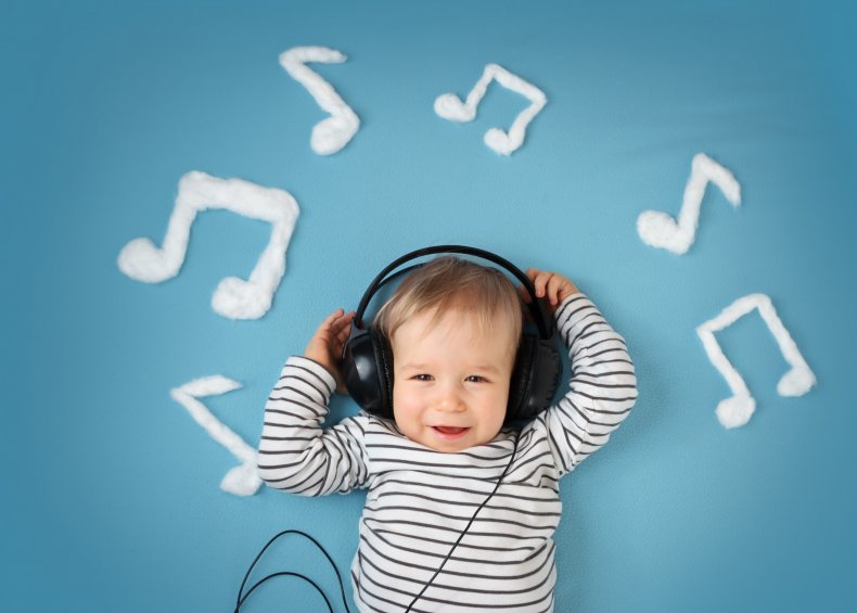 Little boy listening to music 