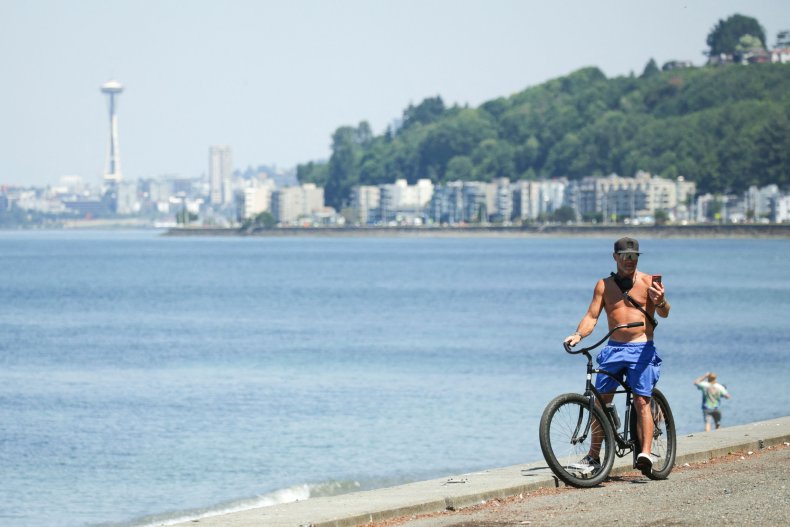 A topless bike-rider in Seattle.