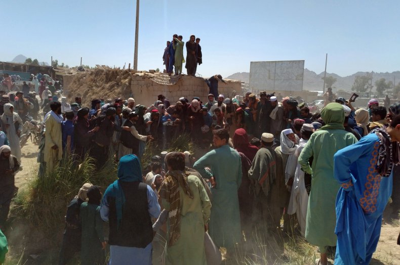 Taliban Fighters and Afghans
