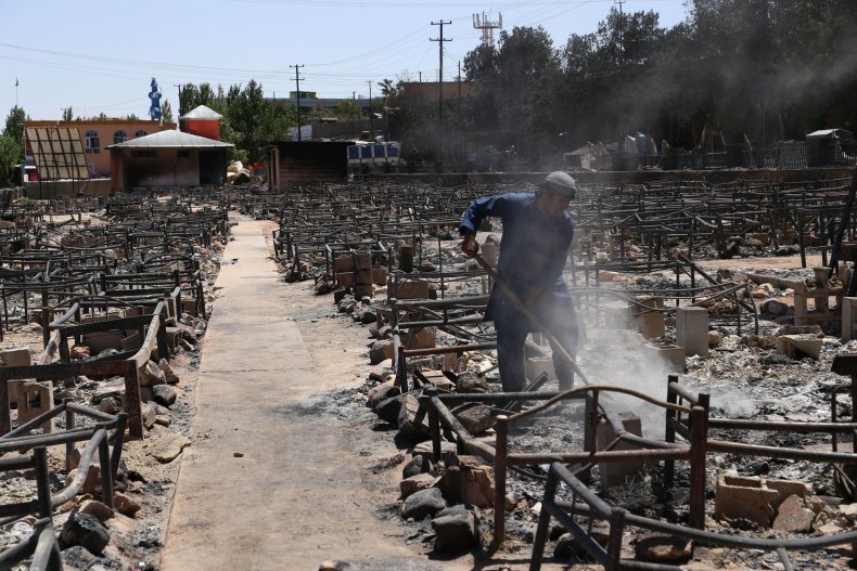 Aftermath of Taliban burning a market.