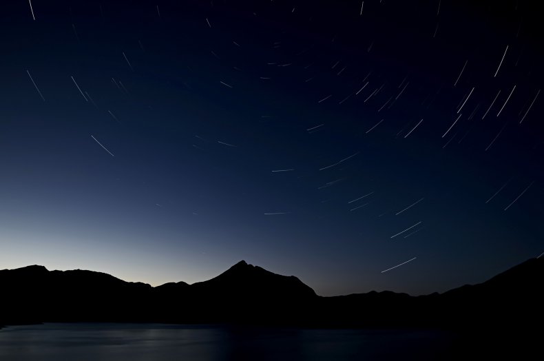 Perseid meteors above Porma Lake, Spain