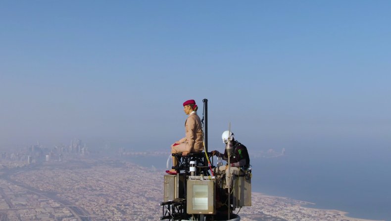 Emirates commercial atop the Burj Khalifa. 