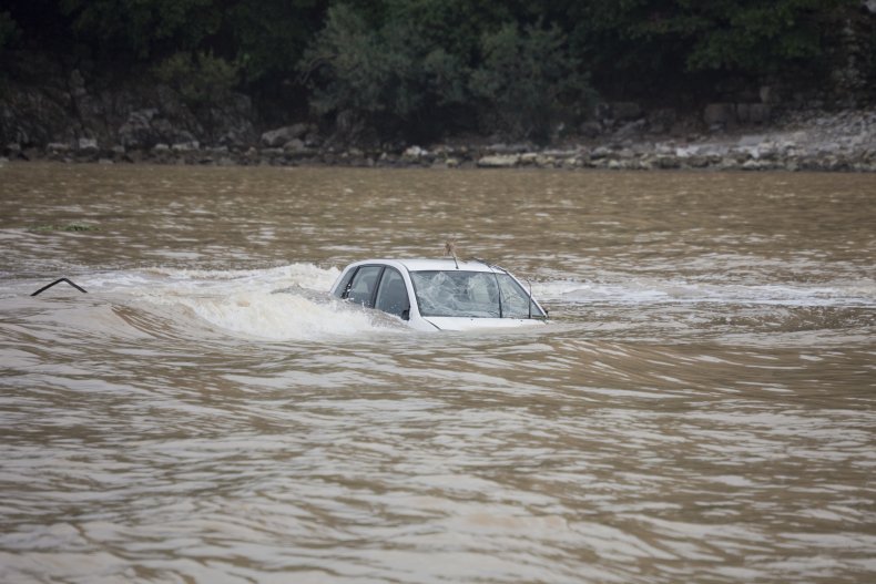 Car driven into river